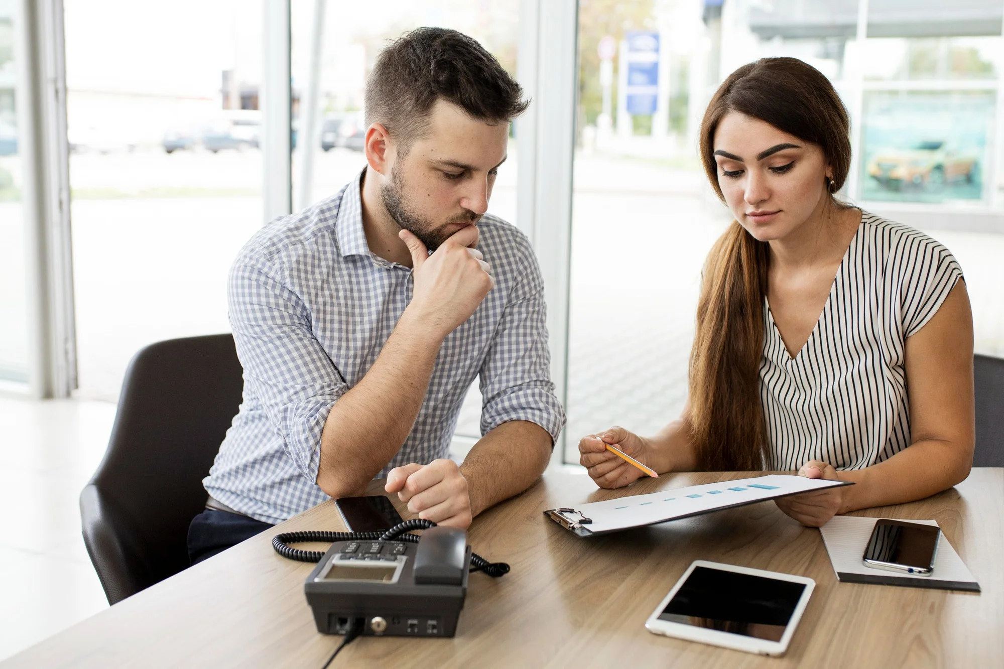 Couple relaxing at home, financially at ease