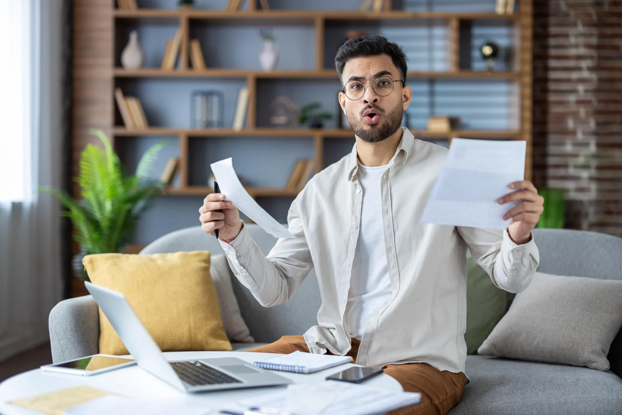 Couple relaxing at home, financially at ease